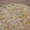 فرش ماشینی شاران هوم طرح خز پرز بلند فانتزی گرد زمینه کرم